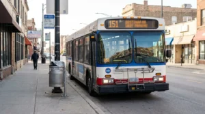 CTA Route 151 bus stopped along urban Chicago street near sidewalk
